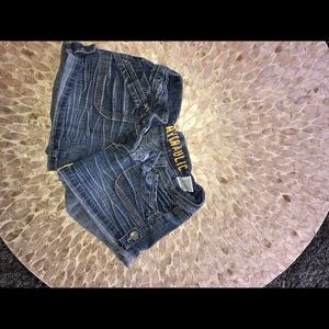 Folded with buttons dark shorts